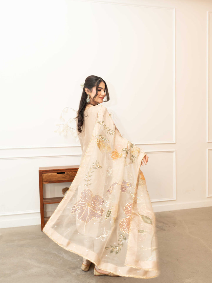 Faryal — beige embroidered silk kameez with bow detail, close up of neckline and bodice embroidery